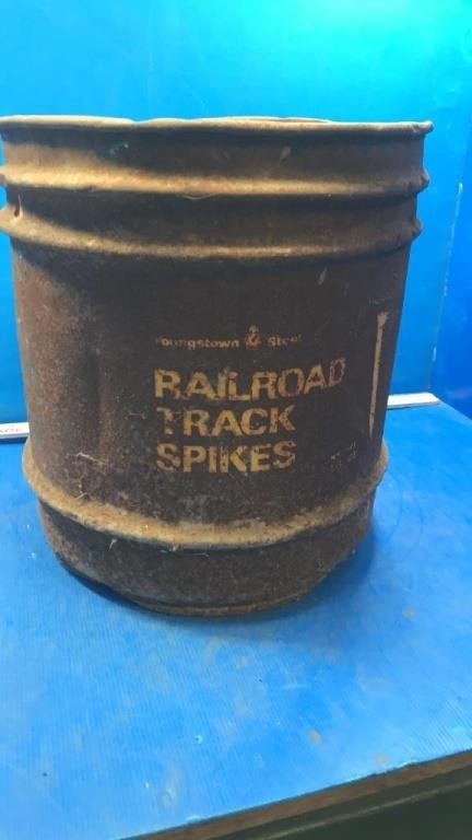 Rusty railroad spikes bucket