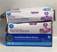 New Vinyl Exam Gloves 
2 Large, 1 XL