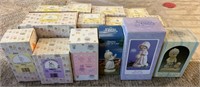 14 boxed Precious Moments figures.