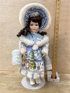 18 inch Porcelain doll in Christmas dress