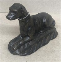 Bronzed dog statue