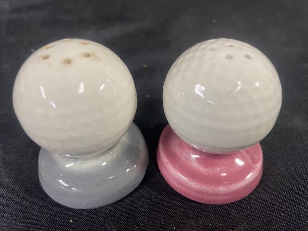 Pair of vintage ceramic golf ball salt and pepper