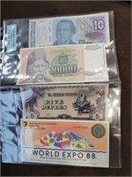 4 foreign currency paper bills