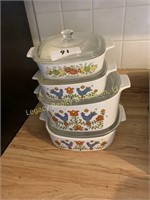 4 corningware dishes with lids