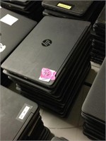 Stack of 10 HP laptops