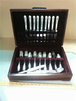 Silver plated silverware set in box.