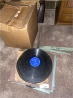 Assorted Victrola records, tape reels