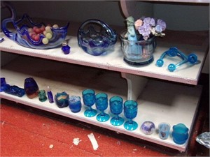 Blue Goose and many other blue glass pieces