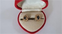 Pair of 9ct gold garnet earrings