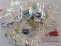 Bag of assorted gemstones Tanzanite Peridot