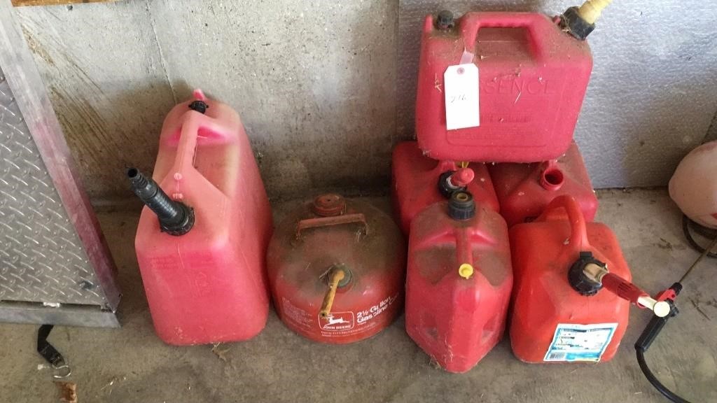 6 plastic gas cans, 1 metal gas can