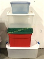 Group of four storage totes with lids