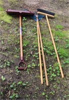 Snow shovel, metal tine rakes and push broom