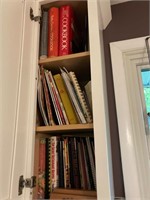 cookbooks incl Pyrex ( cupboard above sink)