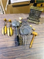 misc vintage items with toaster & shoe stretchers