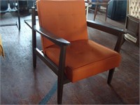 Orange Art Deco chair with wood frame