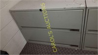 2 drawer metal filing cabinet with file folders