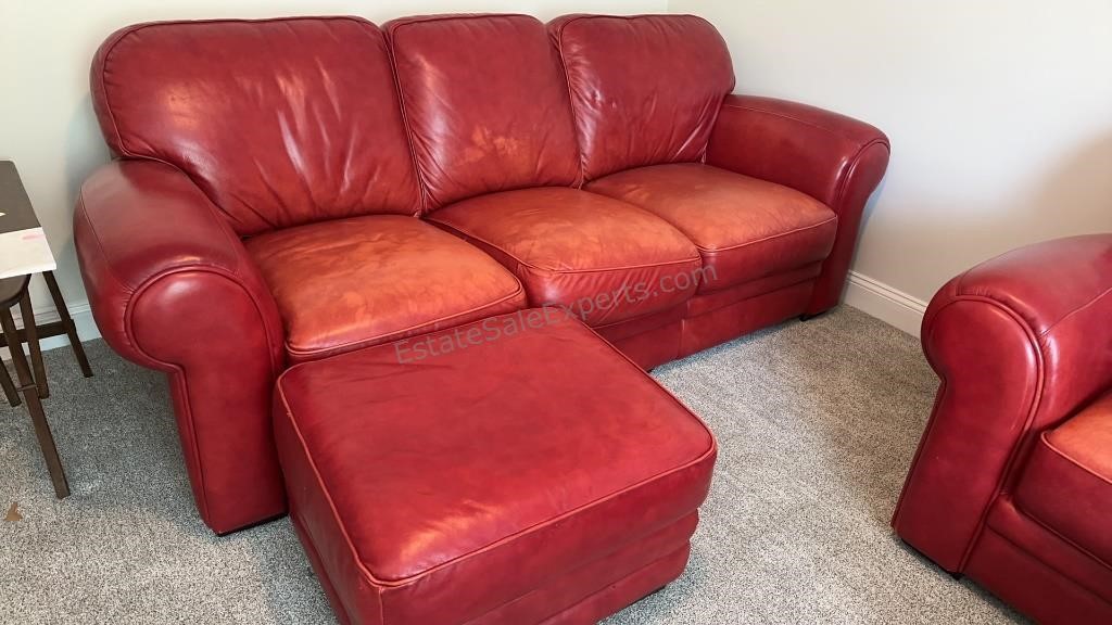 Red leather sofa & ottoman 40”deep x 31” H x 89” L