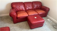 Red leather sofa & ottoman 40”deep x 31” H x 89” L
