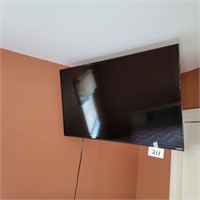 Larger style Vizio TV with wall bracket