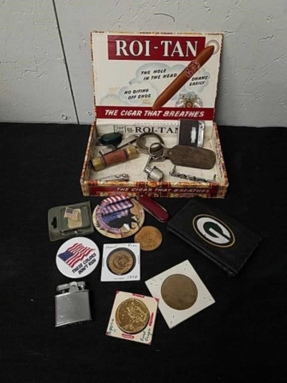 Vintage cigar box with vintage coins, pins,