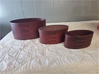 3 red wooden stacking boxes (x1 with lid)