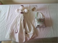 Clock, doll and pillow