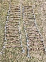 NEW SET OF SKID STEER CHAINS