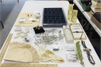 Costume jewelry lot w/ cologne, doilies, &