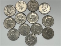 Collection of 13 Kennedy Half Dollars