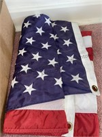 Miscellaneous box lot includes the American flag,