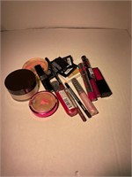 lot of used makeup products