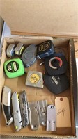 Tape measures, scrapers and utility knives