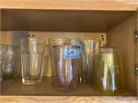 Cabinet with ice cream dishes and cups
