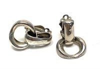 Sterling silver clip earrings with stylized hoop