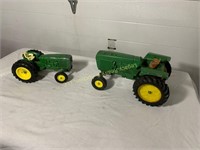2 John Deere toy tractors