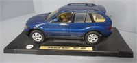 BMW X5 1/18 Scale Diecast Car on Base with