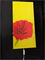 Lovely wall light with poppy on glass panel.