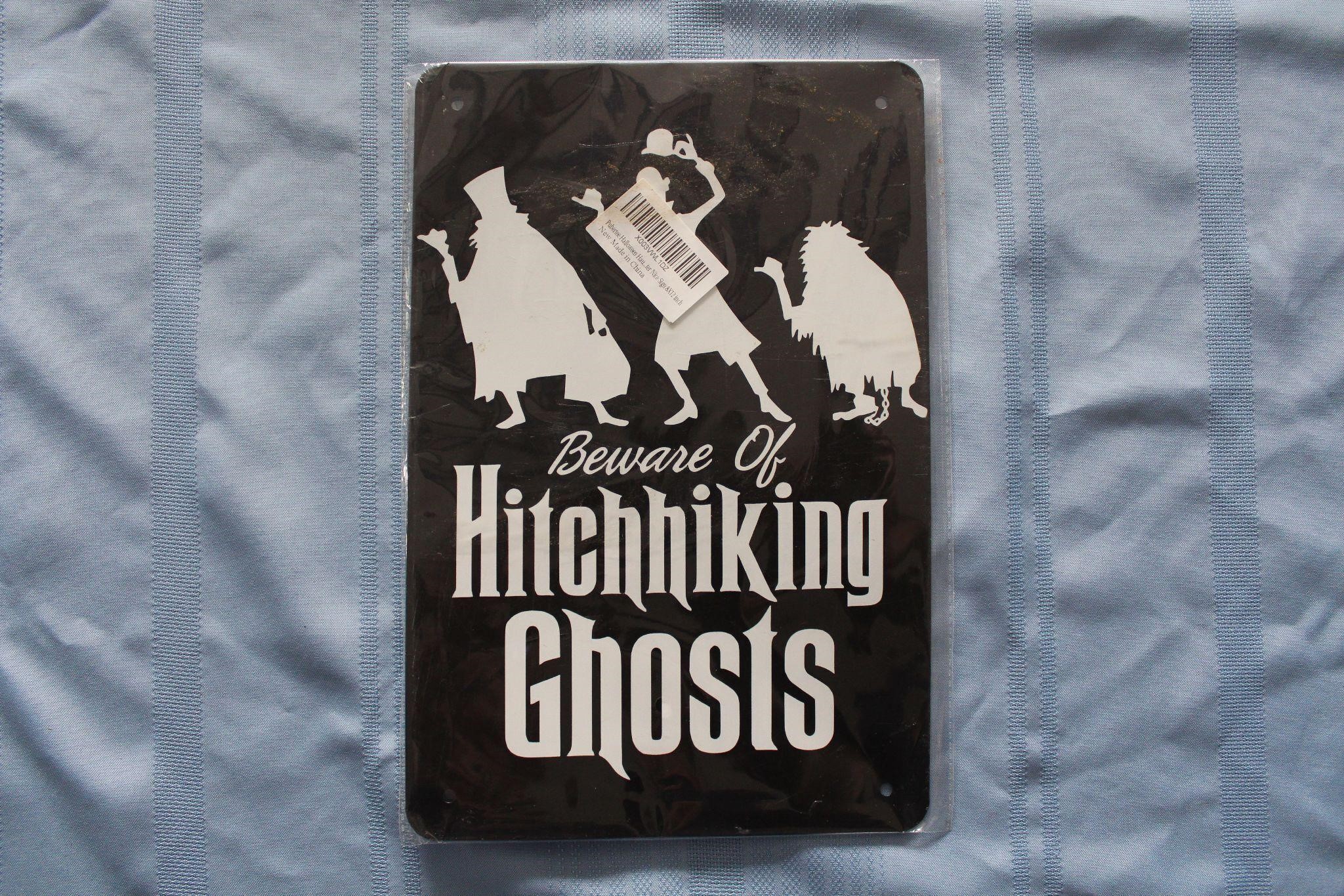 Halloween Tin Sign "Beware Of Hitchhiking Ghosts"
