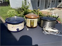 Three crockpots and a carving knife