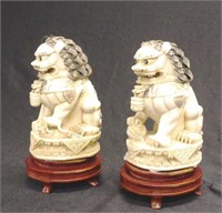 Two good antique carved ivory Temple / Foo dogs