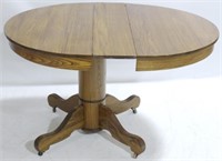 Round Oak Pedestal Table w/ Leaf