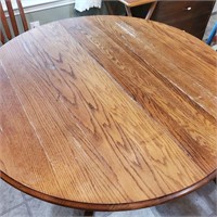 Large Round-to-Oval Dining Table with Chairs