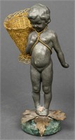Mixed Metal Model Of A Child And Basket