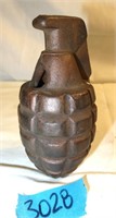 Metal (brass?) cast of a Hand Grenade