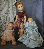 4 dolls; 2 Porcelain, 1 wooden, 1 plastic