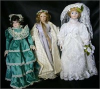 3 Dolls; doll in green dress is a Heritage Mint Lt