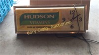 Hudson Vitamins Lighted Up sign And Clock