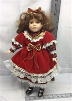 D2) COLLECTOR PORCELAIN DOLL BRUNETTE IN RED WITH
