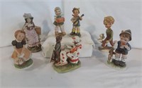 Seven Assorted Collectible Ceramic Figurines
